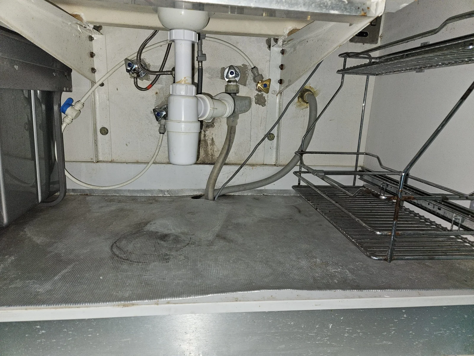 Why Does My Kitchen Sink Cabinet Smell?
