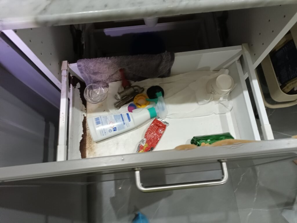 water damaged kitchen sink cabinet in dubai