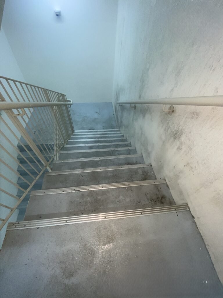 heavy mold and condensation in stairwell of the building in abu dhabi